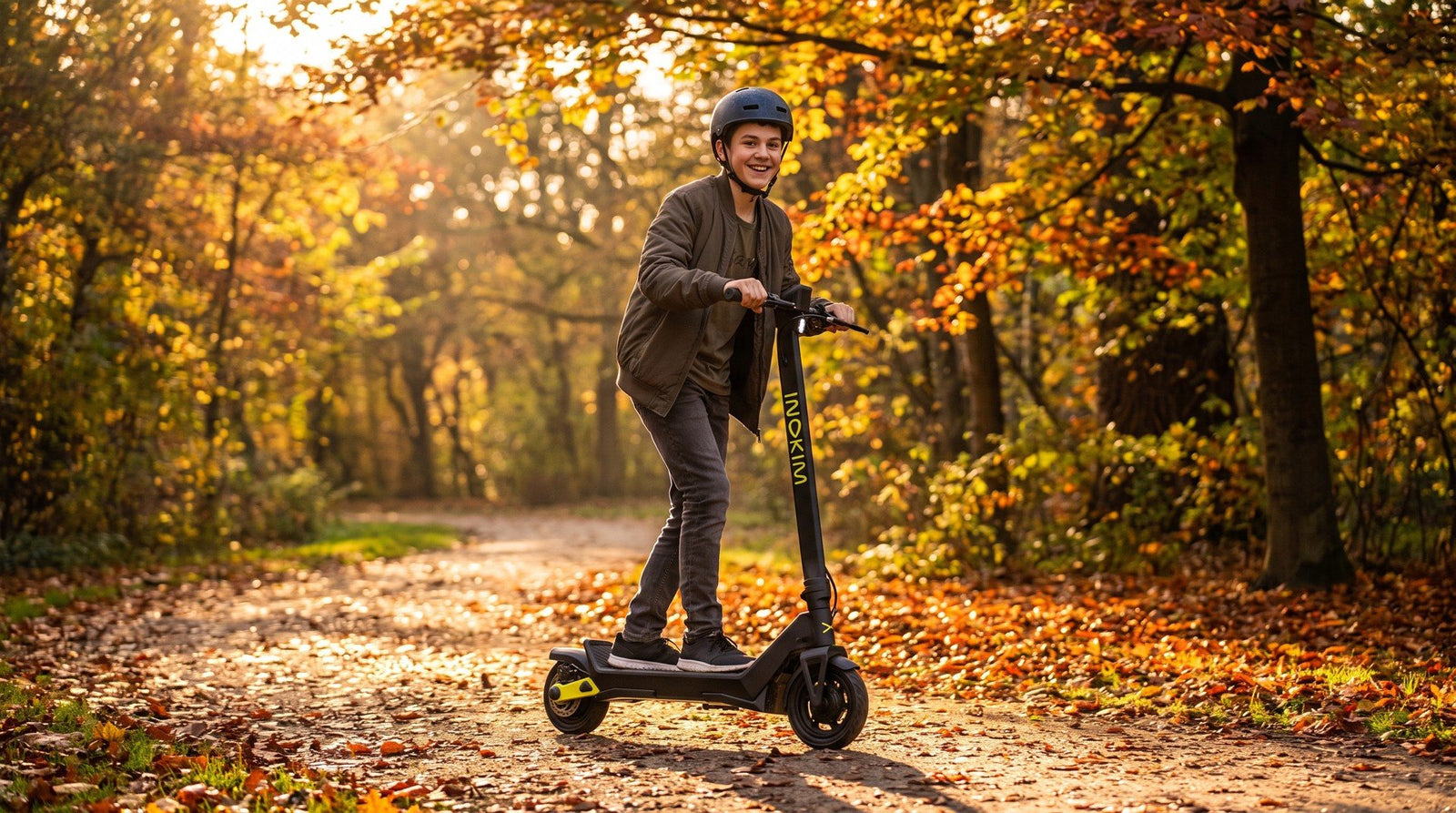 A kid riding the INOKIM KIX in the park