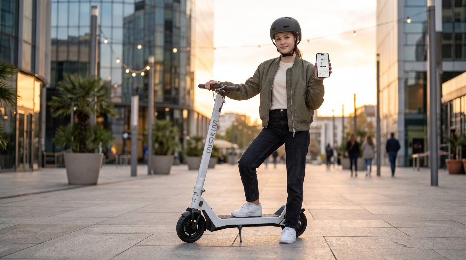 Kids with INOKIM KIX scooters in the city